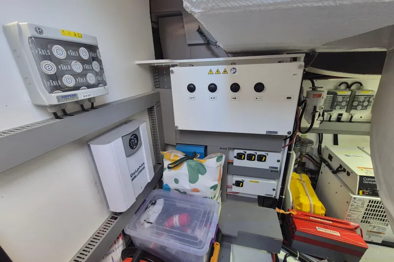  Yacht Photos Pics Electrical system of 2019 Beneteau Gran Turismo 50 Sportfly yacht, featuring control panels and equipment.