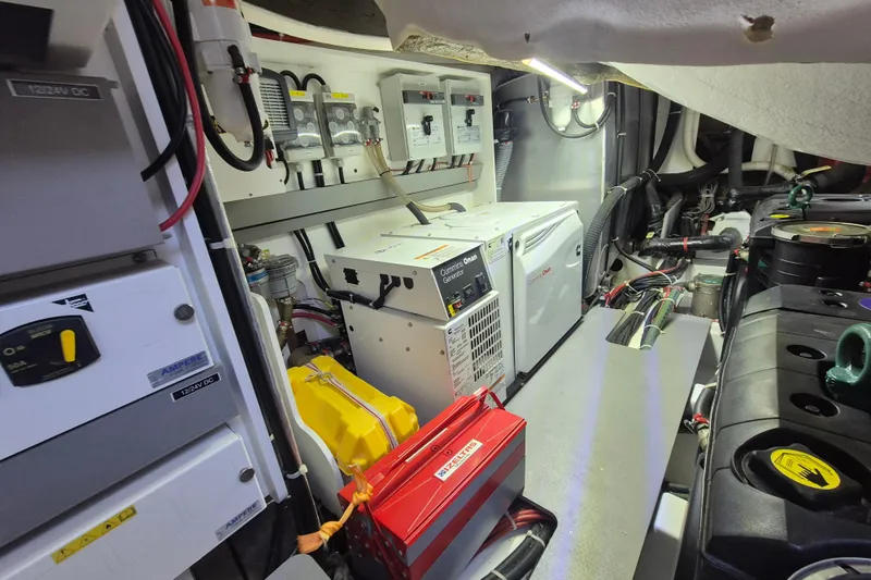  Yacht Photos Pics Engine room of 2019 Beneteau Gran Turismo 50 Sportfly with Cummins Onan generator.