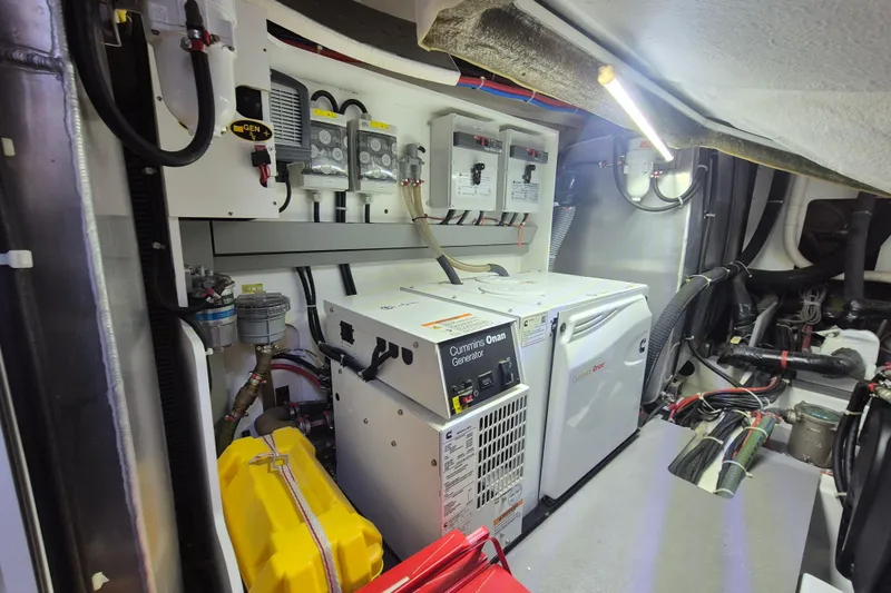  Yacht Photos Pics Engine room of 2019 Beneteau Gran Turismo 50 Sportfly with Cummins Onan generator.