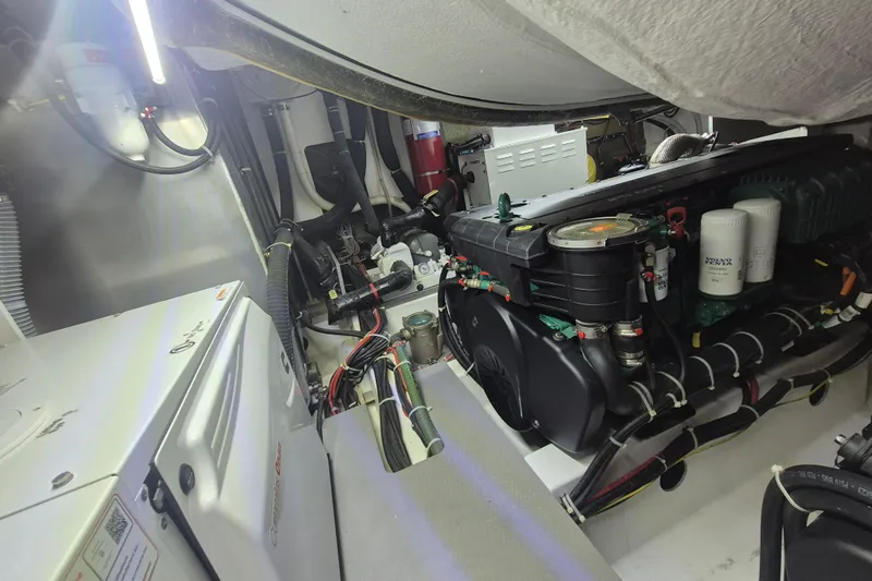  Yacht Photos Pics Engine room of 2019 Beneteau Gran Turismo 50 Sportfly with visible machinery and components.