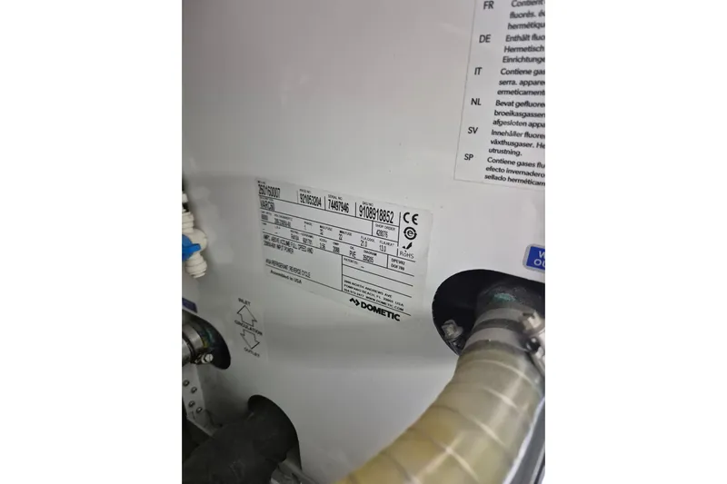  Yacht Photos Pics Label on Dometic equipment inside 2019 Beneteau Gran Turismo 50 Sportfly yacht.
