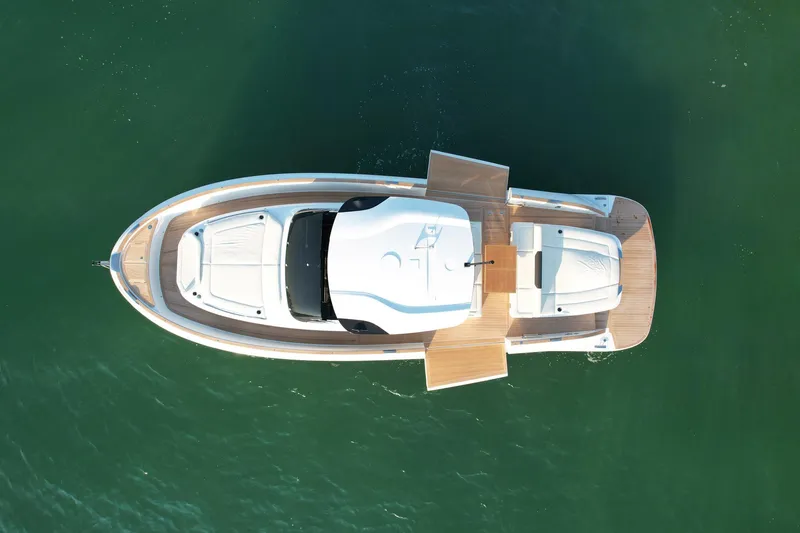  Yacht Photos Pics Aerial view of 2023 Solaris Power 44 Open yacht on calm water.