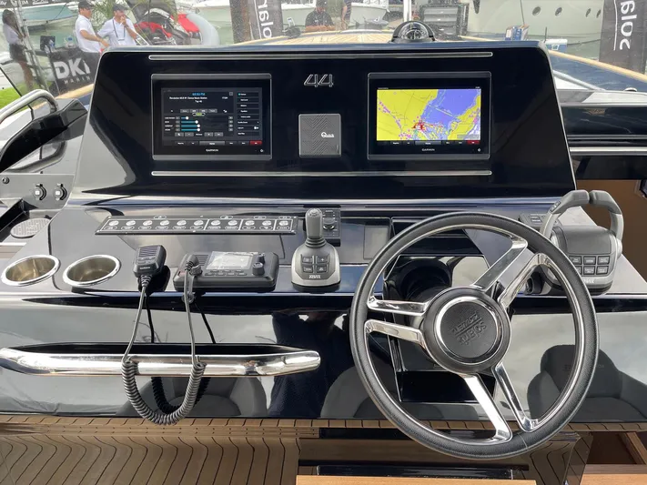  Yacht Photos Pics 2023 Solaris Power 44 Open yacht dashboard with navigation screens and controls.