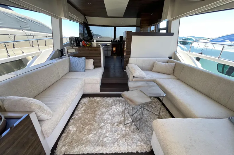  Yacht Photos Pics Luxurious interior of 2025 Ferretti Yachts 670 with elegant seating and modern decor.