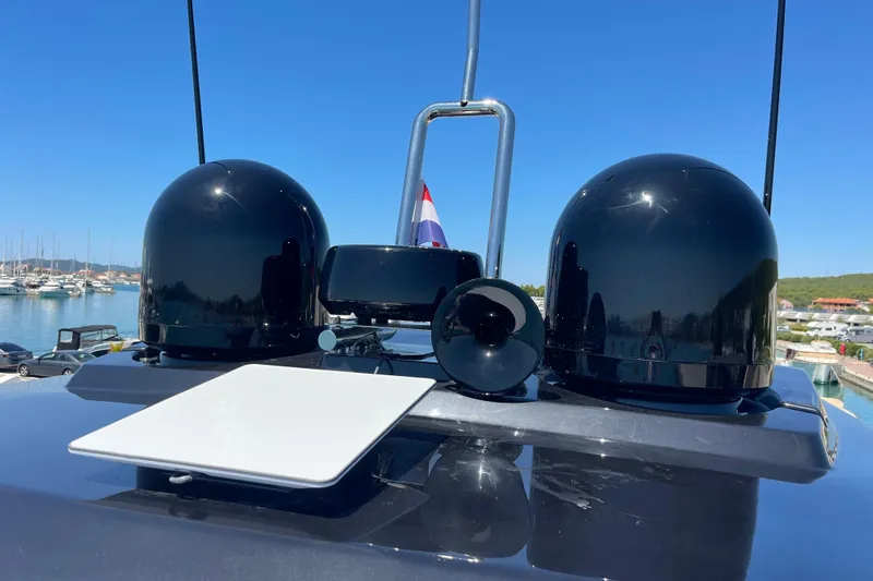  Yacht Photos Pics Ferretti Yachts 670, 2025 model, featuring advanced radar and communication equipment on deck.