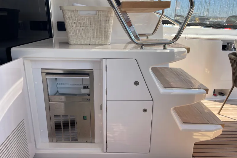  Yacht Photos Pics 2025 Ferretti Yachts 670 interior with steps, storage, and seating area.