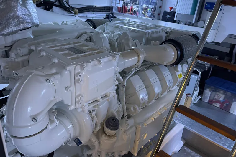  Yacht Photos Pics Engine room of 2025 Ferretti Yachts 670, showcasing powerful marine engine components.