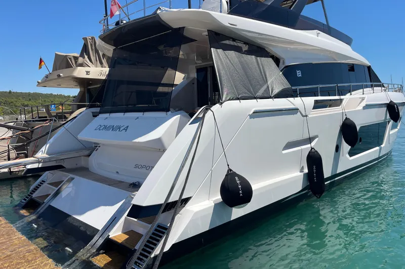  Yacht Photos Pics 2025 Ferretti Yachts 670 docked, featuring sleek design and modern amenities.