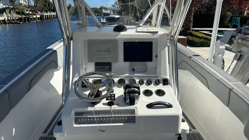  Yacht Photos Pics 2021 Blackwater 36 SF boat console with steering wheel and navigation controls.