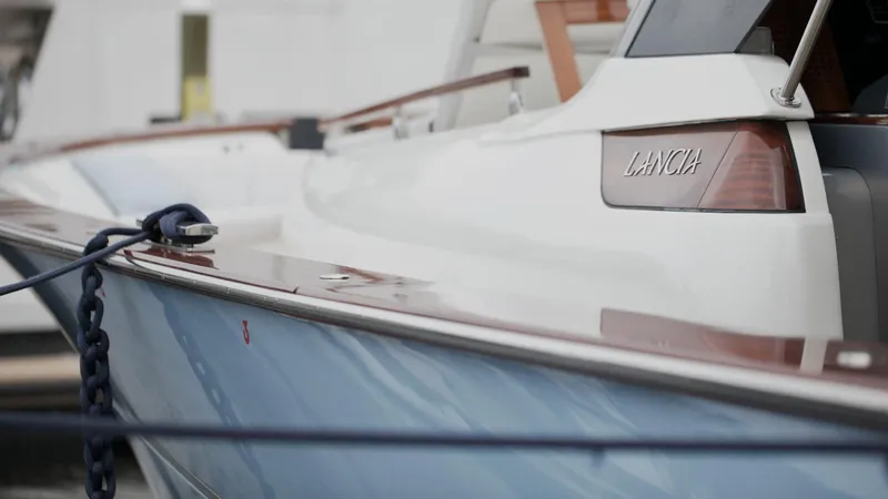 Lancia Aprea Yacht Photos Pics 2024 Lancia Aprea 52 boat, sleek design with polished wood accents and modern detailing.