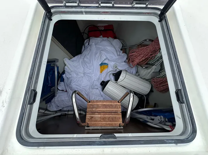 Painkiller Yacht Photos Pics Storage compartment of 2020 Bavaria C50 yacht with ropes and equipment.