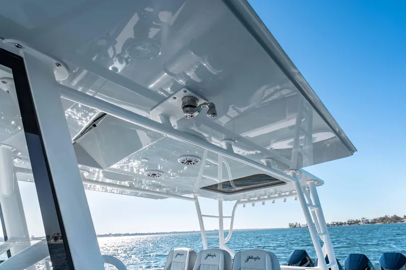  Yacht Photos Pics 2023 Yellowfin 42 Offshore boat, featuring sleek design and advanced technology on open water.