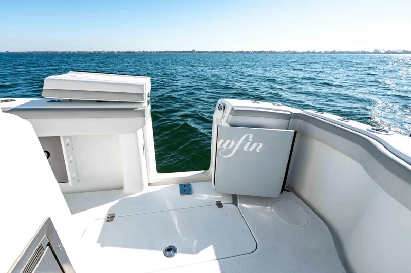 Yacht Photos Pics 2023 Yellowfin 42 Offshore boat deck with ocean view, featuring sleek design and spacious layout.