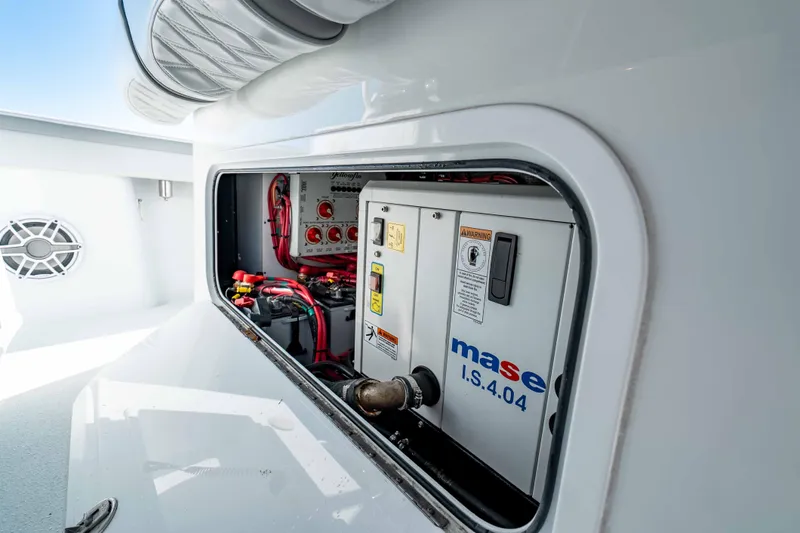  Yacht Photos Pics 2023 Yellowfin 42 Offshore boat engine compartment with Mase generator and wiring.