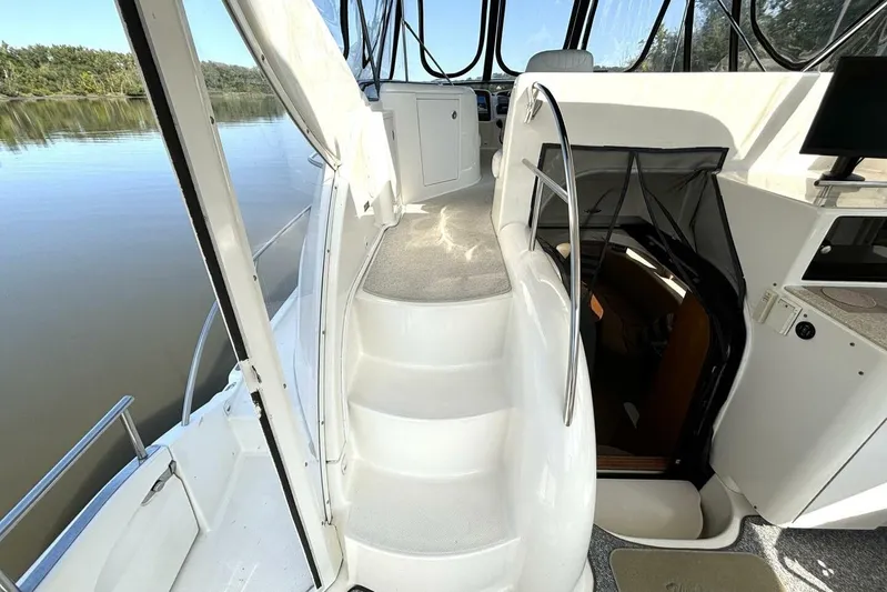  Yacht Photos Pics 2004 Meridian 459 Cockpit Motoryacht interior with stairs and cockpit view.
