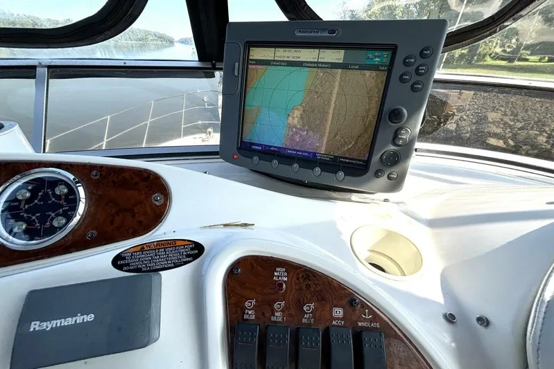  Yacht Photos Pics Cockpit of 2004 Meridian 459 Motoryacht with navigation system and control panel.