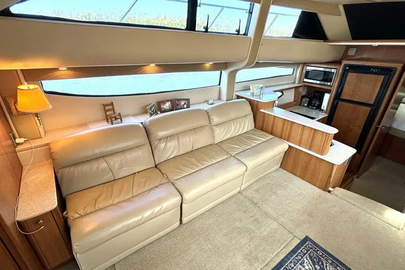  Yacht Photos Pics Luxurious interior of 2004 Meridian 459 Cockpit Motoryacht with leather seating and modern amenities.