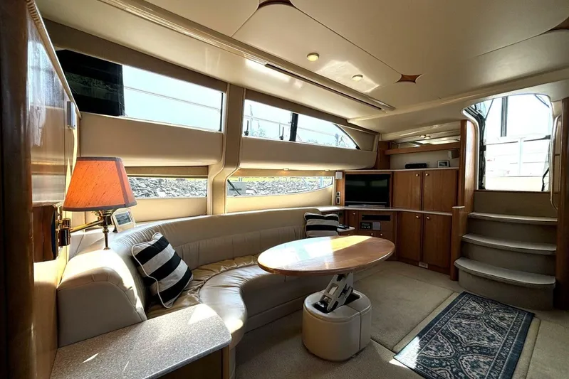  Yacht Photos Pics Luxurious interior of 2004 Meridian 459 Cockpit Motoryacht with elegant seating and modern amenities.