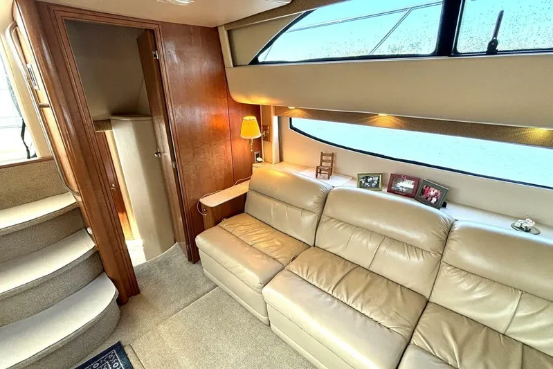  Yacht Photos Pics Luxurious interior of 2004 Meridian 459 Cockpit Motoryacht with leather seating and elegant decor.
