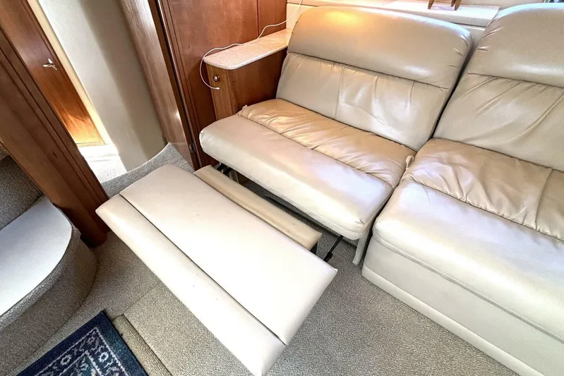  Yacht Photos Pics Luxurious interior of 2004 Meridian 459 Cockpit Motoryacht with beige leather seating.