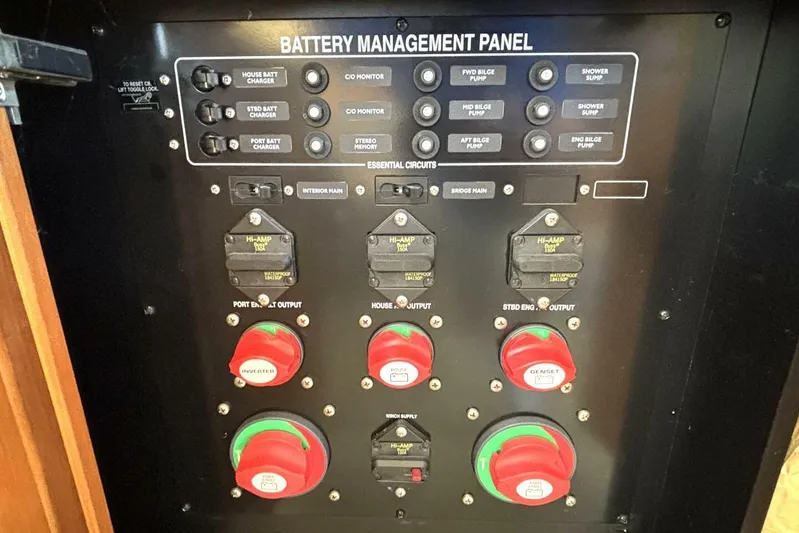 Yacht Photos Pics Battery management panel of 2004 Meridian 459 Cockpit Motoryacht with essential circuit controls.