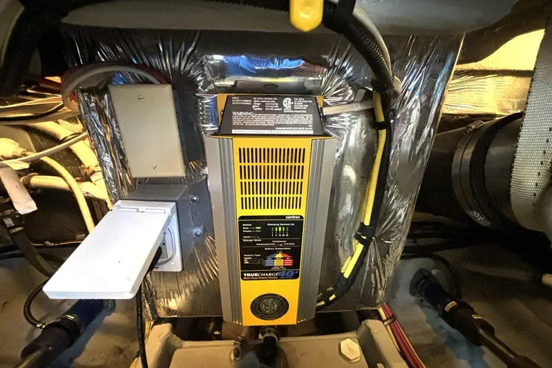  Yacht Photos Pics Engine room of 2004 Meridian 459 Cockpit Motoryacht with electrical components and wiring.