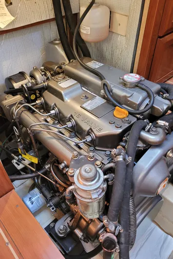 Caribbean Breeze Yacht Photos Pics Engine of 2010 Hunter 45 Deck Salon sailboat, showcasing intricate mechanical components.