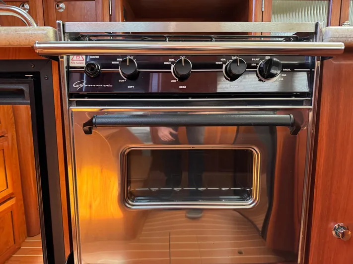 Caribbean Breeze Yacht Photos Pics Stainless steel oven in 2010 Hunter 45 Deck Salon yacht kitchen.