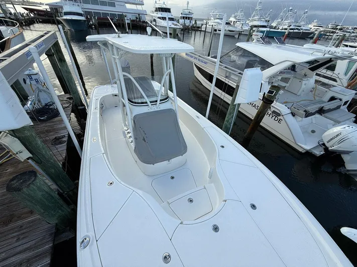  Yacht Photos Pics 2018 SeaVee 270Z boat docked at marina, surrounded by other vessels.