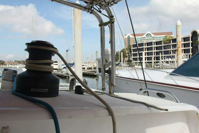 Chasing The Dream Yacht Photos Pics Sailboat deck view of 1995 Voyage Yachts Mayotte in marina setting.