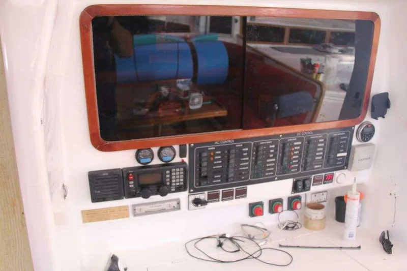 Chasing The Dream Yacht Photos Pics Control panel of a 1995 Voyage Yachts Mayotte, featuring navigation and communication equipment.