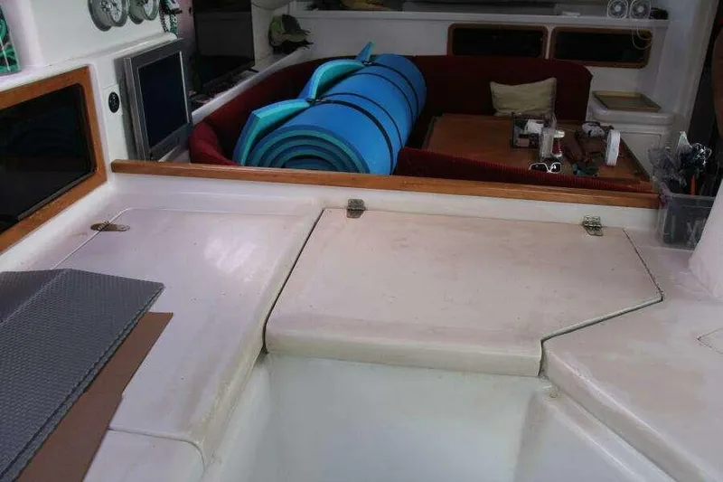 Chasing The Dream Yacht Photos Pics Interior of 1995 Voyage Yachts Mayotte with seating and rolled mats.