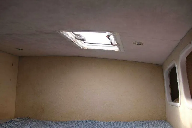 Chasing The Dream Yacht Photos Pics Interior cabin of 1995 Voyage Yachts Mayotte with skylight and windows.