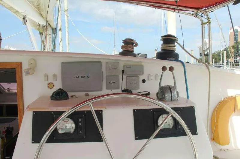 Chasing The Dream Yacht Photos Pics Steering console of 1995 Voyage Yachts Mayotte catamaran with Garmin navigation system.