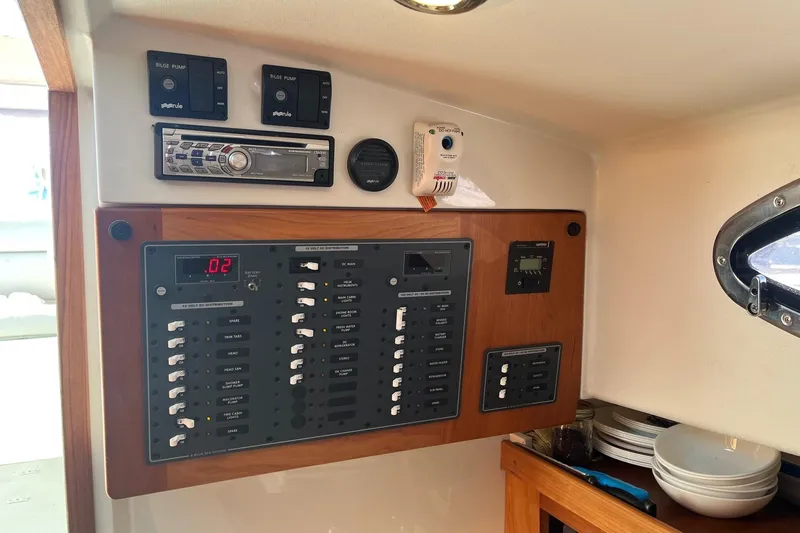 Sandpiper Yacht Photos Pics Electrical control panel inside a 2008 Back Cove 29 boat cabin.