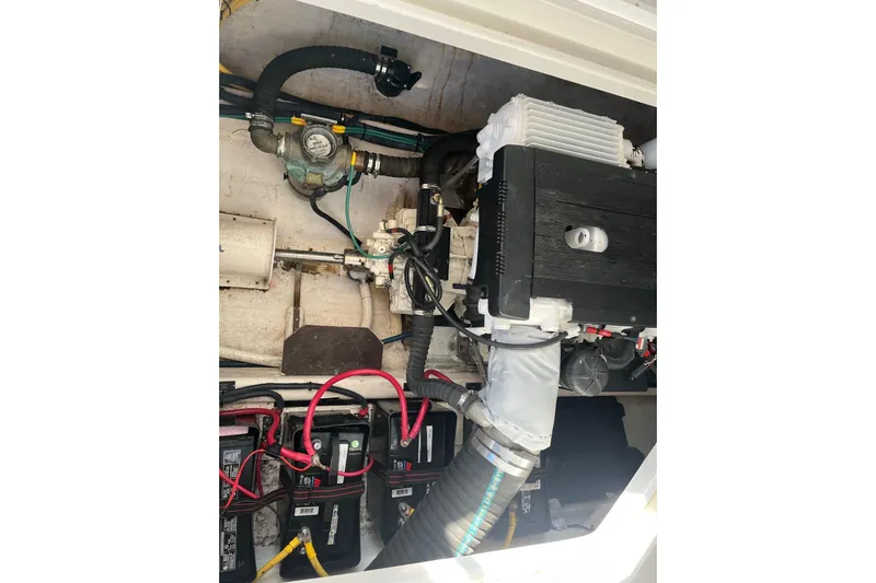 Sandpiper Yacht Photos Pics Engine compartment of a 2008 Back Cove 29 boat, showing mechanical components and wiring.