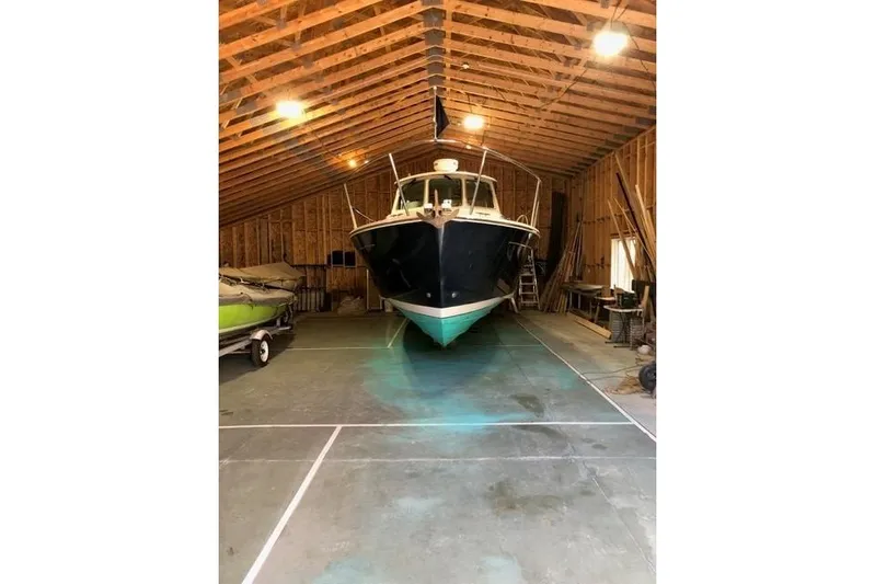 Sandpiper Yacht Photos Pics 2008 Back Cove 29 boat stored in a wooden garage.
