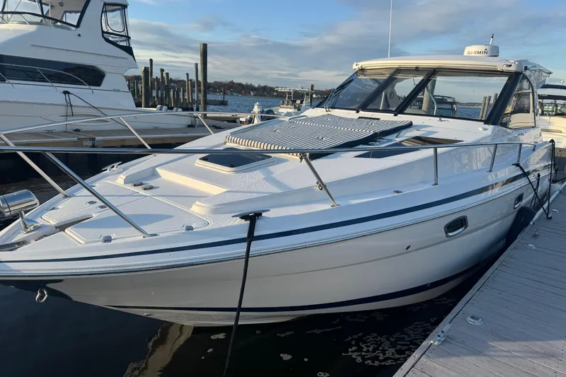  Yacht Photos Pics 2017 Regal 35 Sport Coupe docked at marina, showcasing sleek design and modern features.