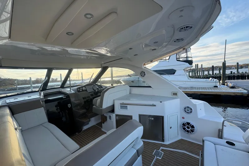  Yacht Photos Pics Interior view of a 2017 Regal 35 Sport Coupe yacht at a marina.