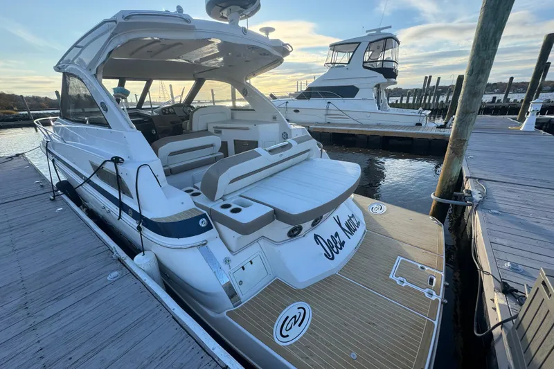  Yacht Photos Pics 2017 Regal 35 Sport Coupe docked at marina, showcasing sleek design and spacious deck.