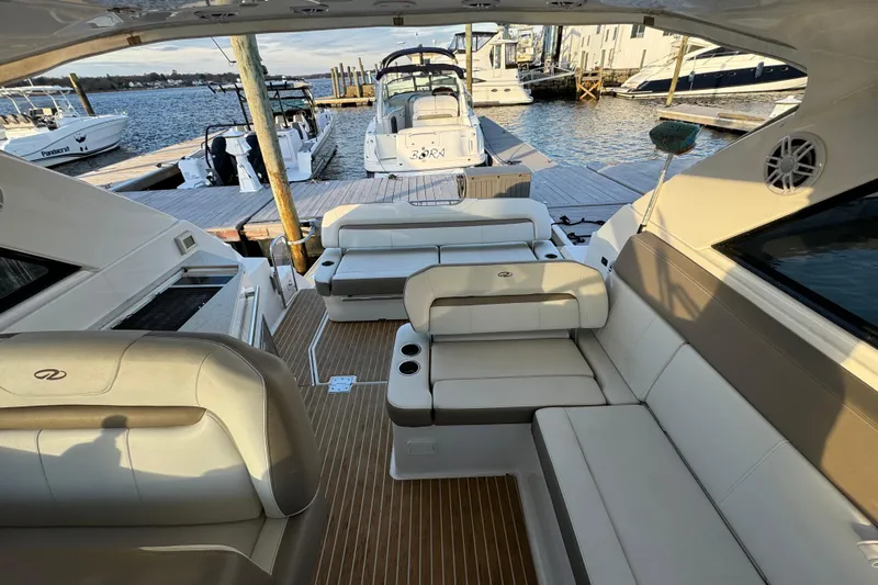  Yacht Photos Pics Luxurious interior of 2017 Regal 35 Sport Coupe yacht docked at marina.