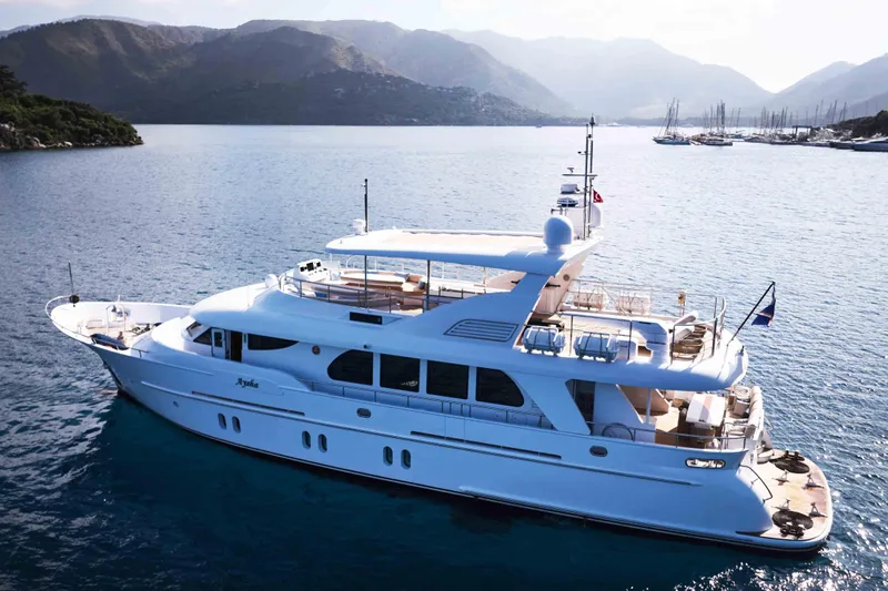 Aysha Yacht Photos Pics Luxurious 2012 Timmerman 26 yacht cruising in scenic coastal waters.