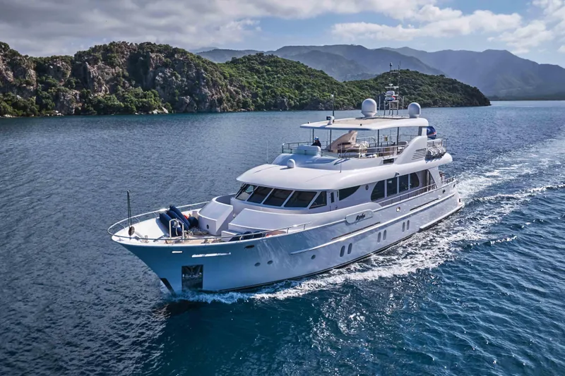 Aysha Yacht Photos Pics Luxurious 2012 Timmerman 26 yacht cruising in scenic coastal waters.