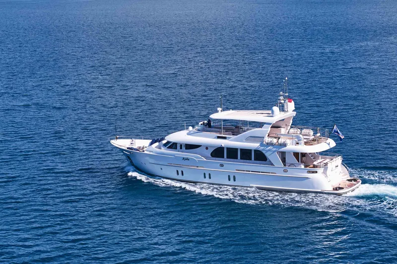 Aysha Yacht Photos Pics Luxurious 2012 Timmerman 26 yacht cruising on open blue sea.