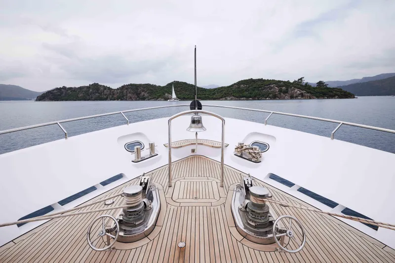 Aysha Yacht Photos Pics Bow view of 2012 Timmerman 26 yacht, featuring sleek deck design and scenic ocean backdrop.