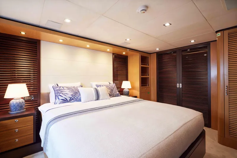 Aysha Yacht Photos Pics Luxurious Timmerman 26 yacht bedroom interior with elegant lighting and wooden accents, 2012 model.