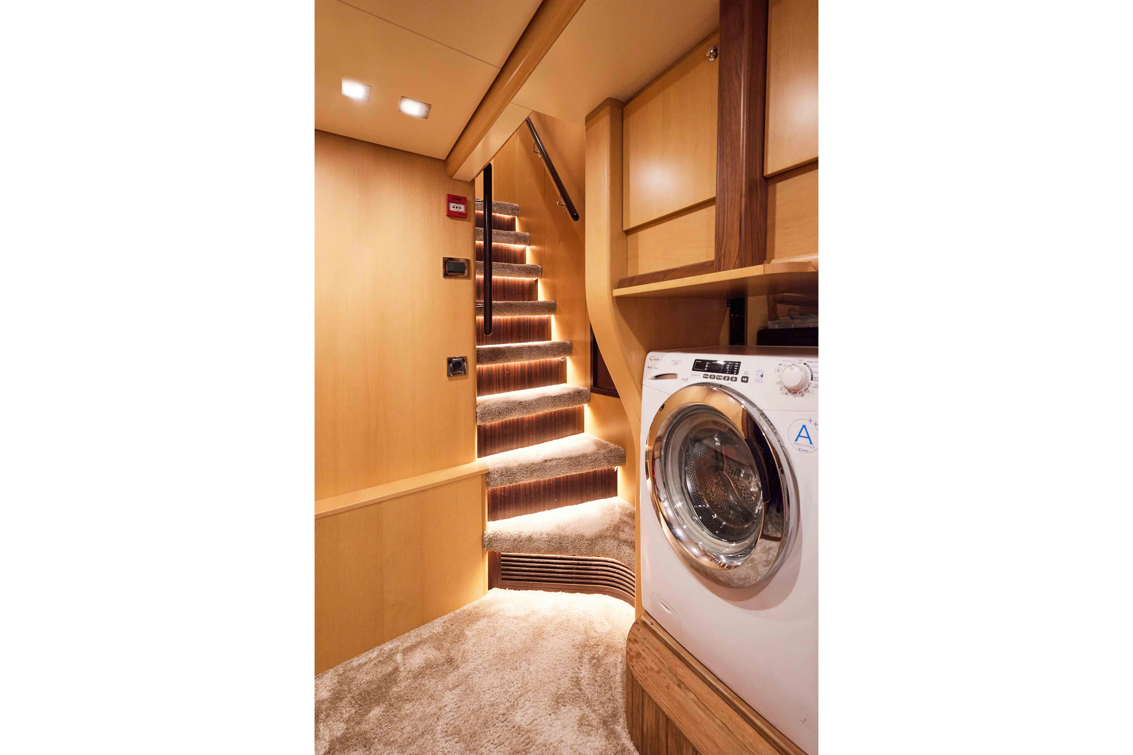 Aysha Yacht Photos Pics Luxurious Timmerman 26 yacht interior with carpeted stairs and washing machine, 2012 model.