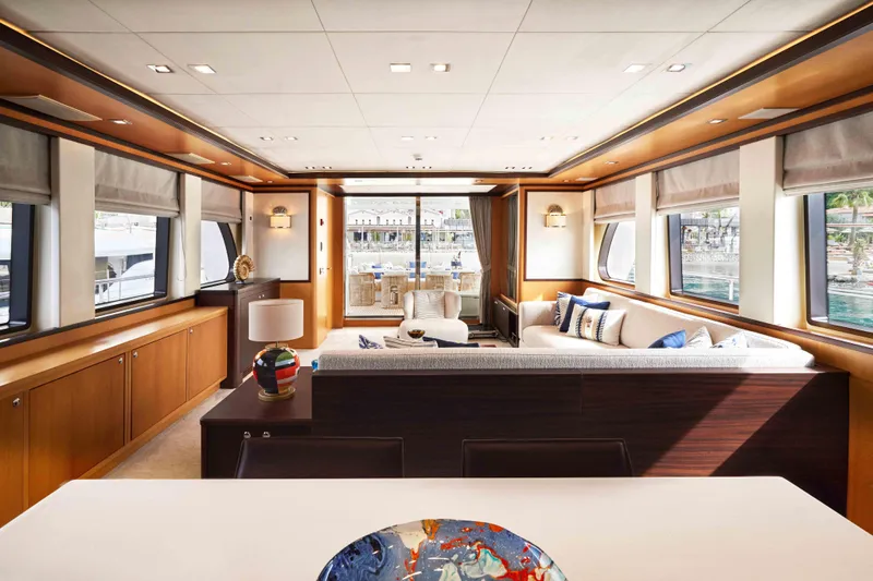 Aysha Yacht Photos Pics Luxurious Timmerman 26 yacht interior, 2012 model, featuring elegant seating and large windows.