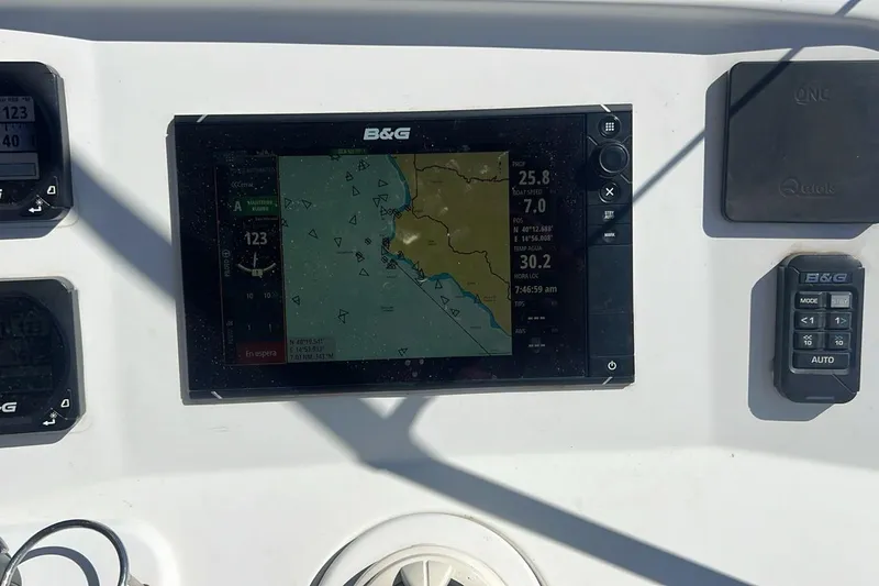 Honu Yacht Photos Pics Navigation system on a 2015 Lagoon 450 F catamaran, displaying nautical charts and data.