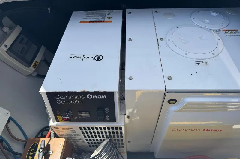 Honu Yacht Photos Pics Cummins Onan generator in a 2015 Lagoon 450 F yacht engine compartment.